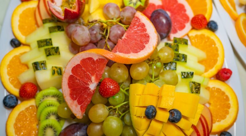 Vibrant and delicious fruit platter featuring grapefruit, mango, kiwi, and more.